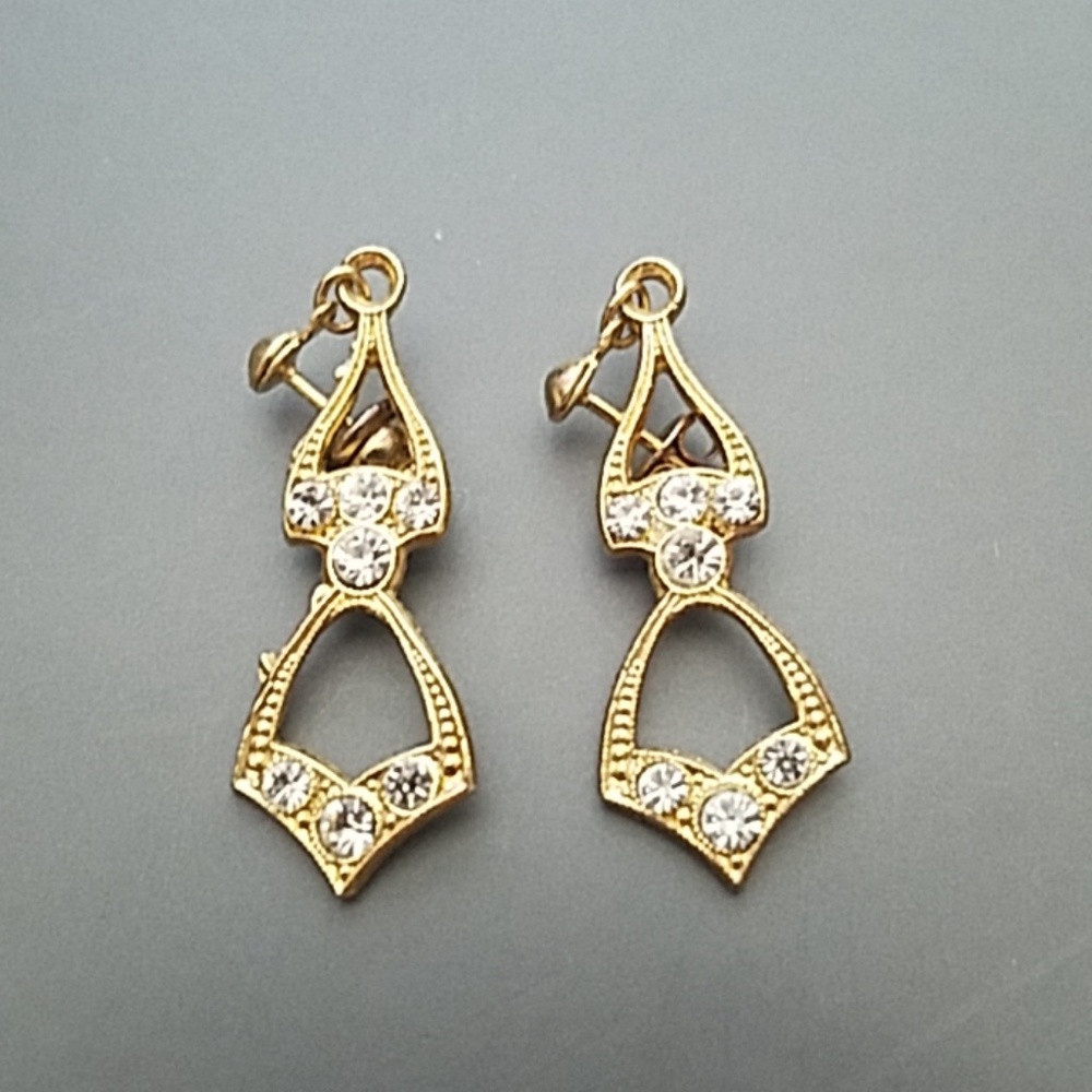Gold and rhinestone costume earrings pierced